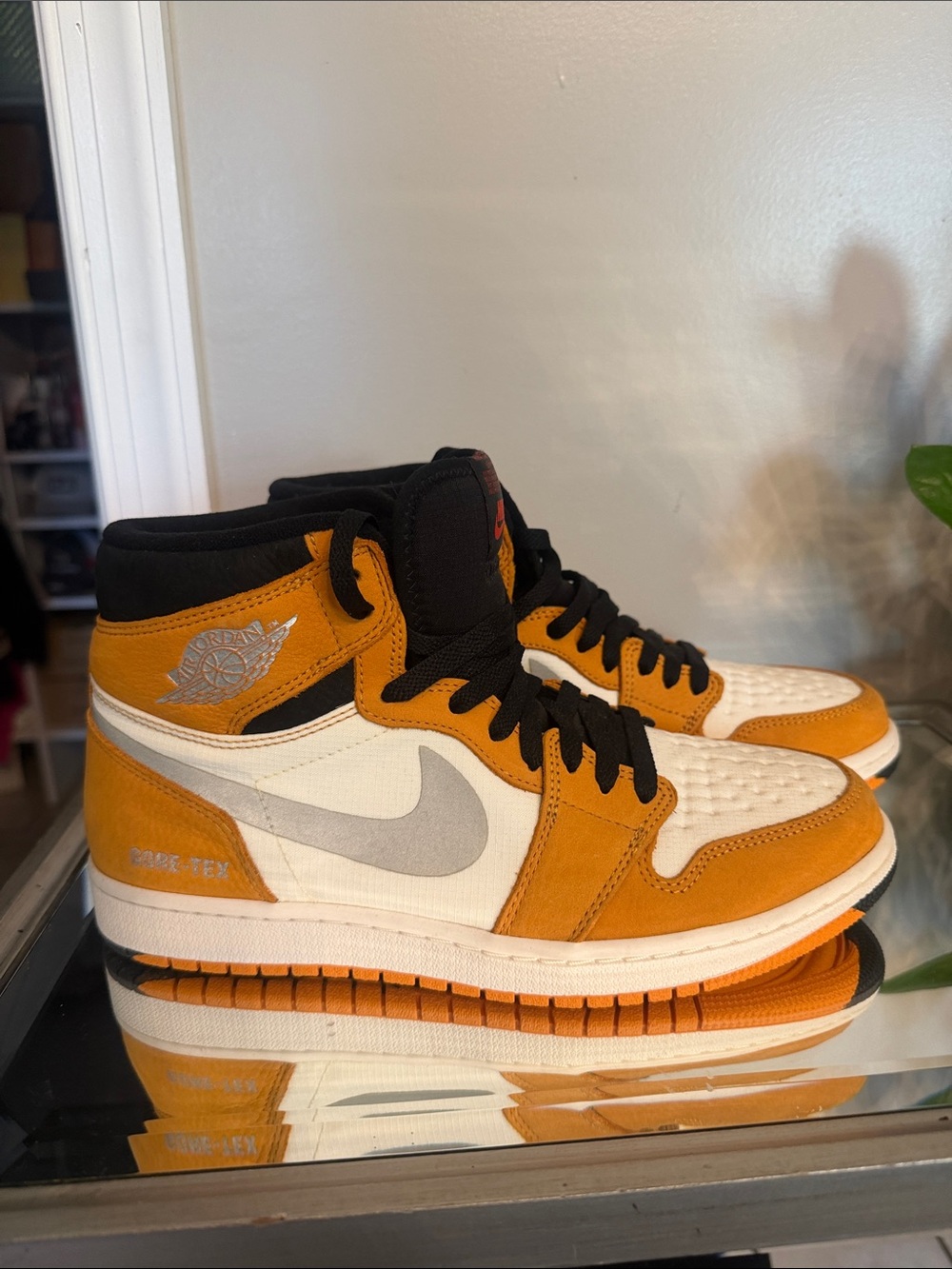 Jordan Men’s High-Top Sneakers in White, Orange and Black